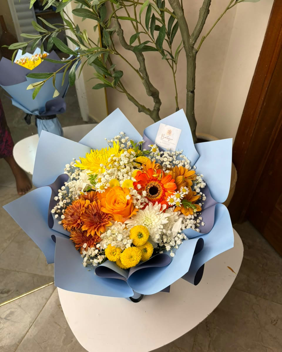 A finished arrangement on the studio stand at Boutique Florals & Giftings in Accra