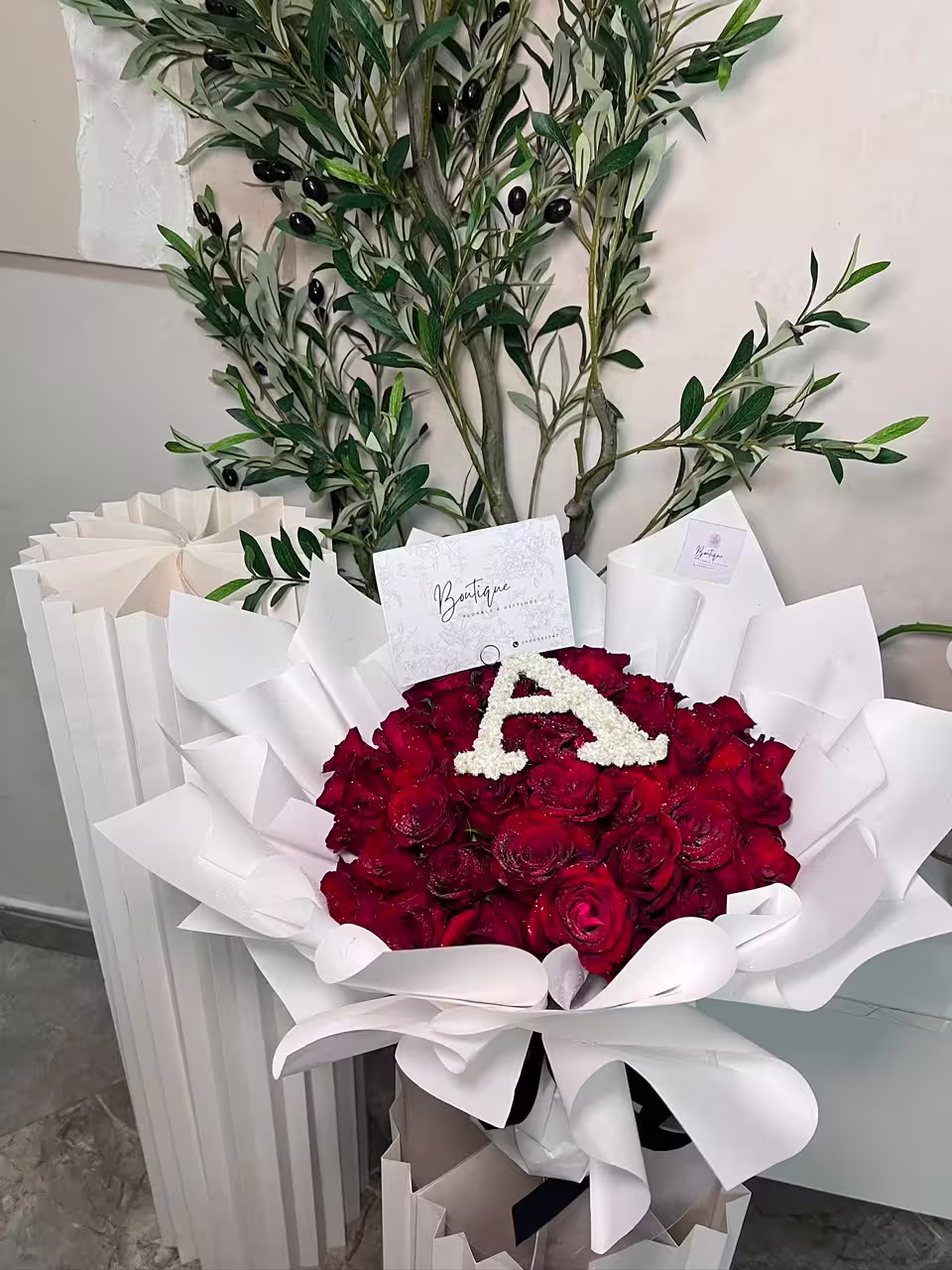 50 Stems And Initial — flowers delivered in Accra