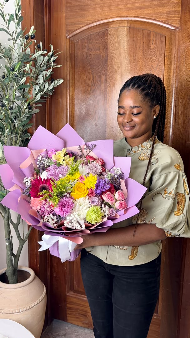 Medium mixed — flowers delivered in Accra