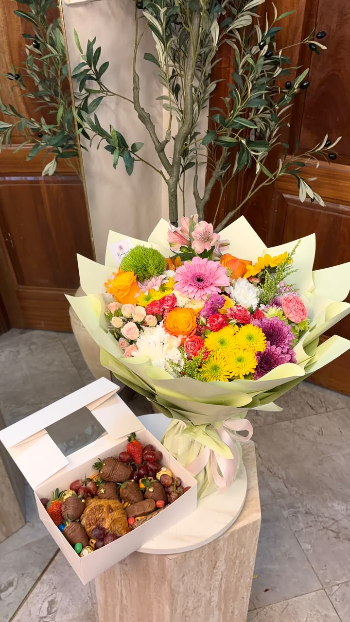 medium mixed & snack box combo — flowers delivered in Accra