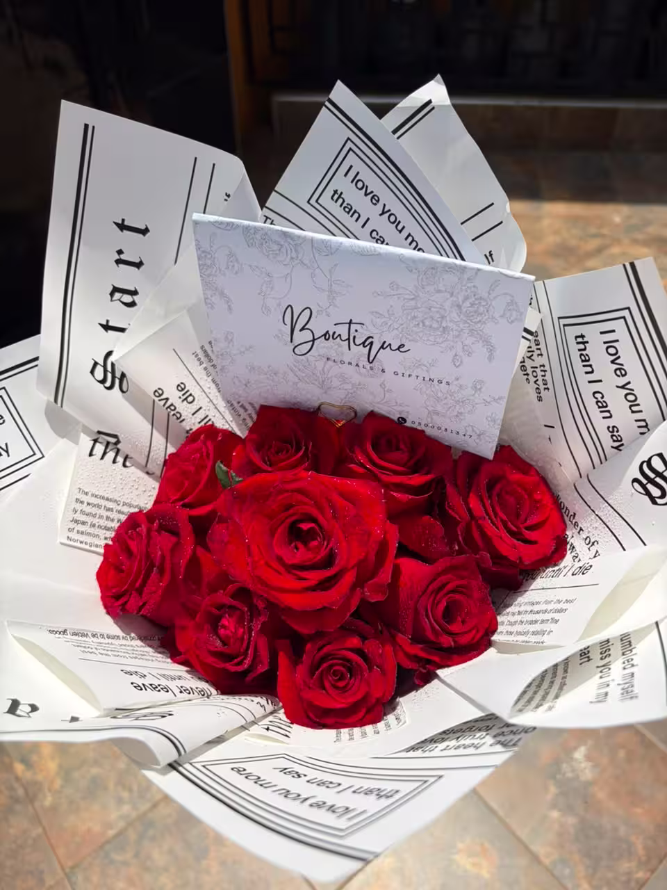 10 Stems Red Roses — detail 2 — flowers delivered in Accra