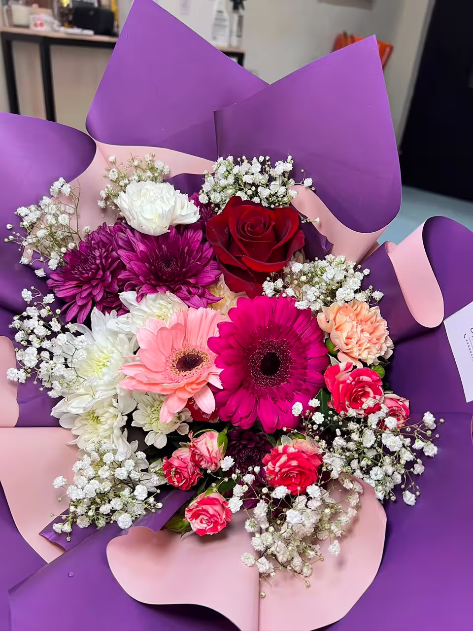 Medium mixed — flowers delivered in Accra