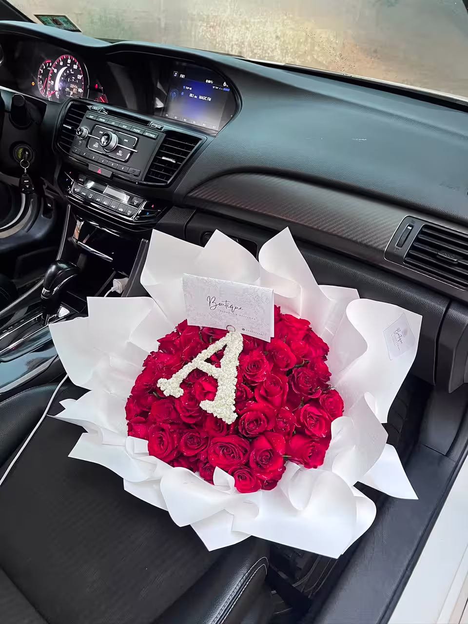 50 Stems And Initial — detail 1 — flowers delivered in Accra